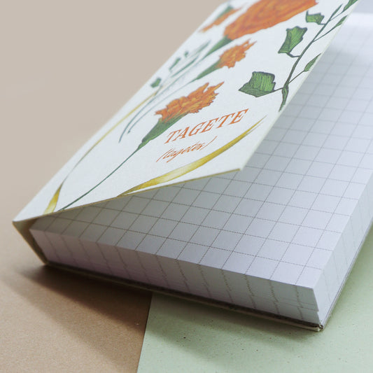 Appunti Pixie di Piperita: blocchi tascabili con grafica botanica, pagine a quadretti e copertina in carta riciclata, perfetti per notes e appunti creativi.