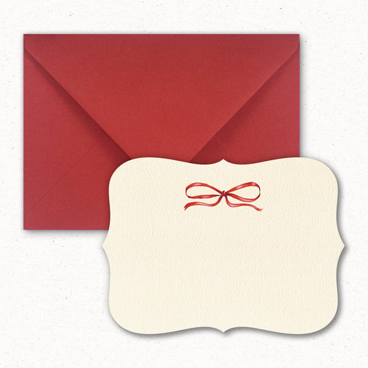 Cartolina Fiocco Rosso di Piperita Paper: sagomata con busta rossa, stampa a colori, perfetta per scrivere i vostri auguri di Natale