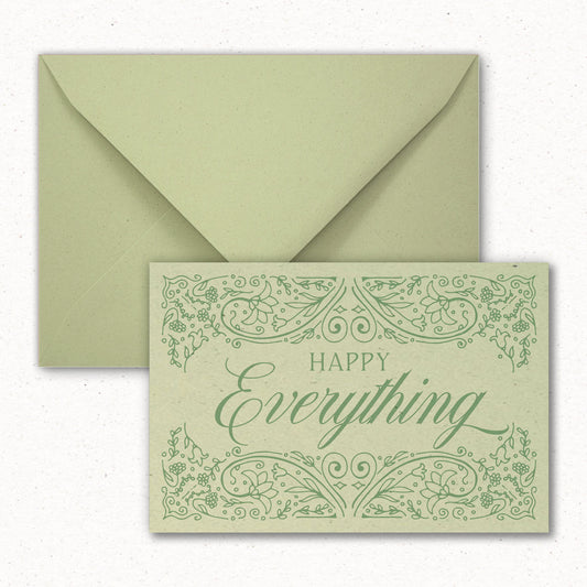 Cartolina Happy Everything di Piperita Paper con busta verde, stampa a colori su carta riciclata verde, perfetta per scrivere i vostri auguri di Natale.