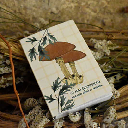 Appunti Pixie di Piperita: blocchi tascabili con grafica botanica, pagine a quadretti e copertina in carta riciclata, perfetti per notes e appunti creativi.